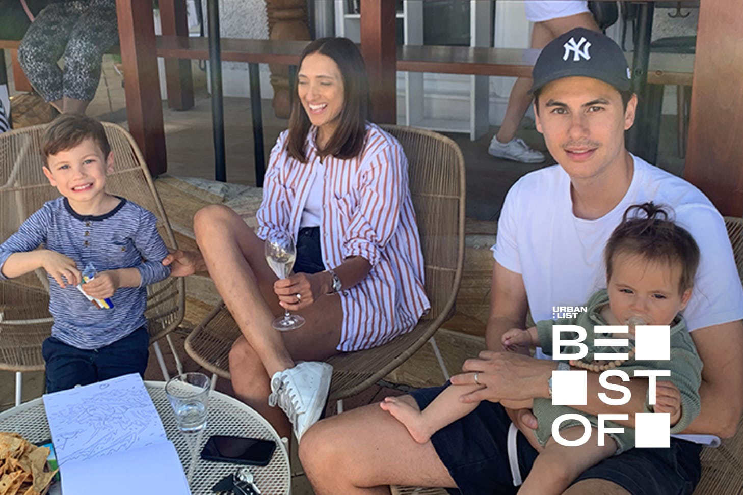 A family sitting together at a cafe.